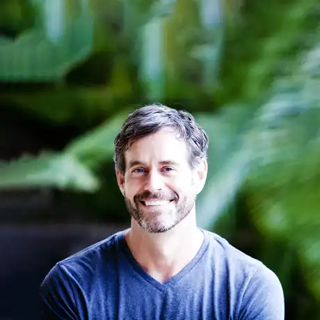 smiling man wearing t-shirt